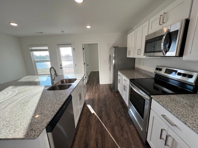 Building Photo - New Beginnings Start with AMRR: 3 Bedroom ready for move in!