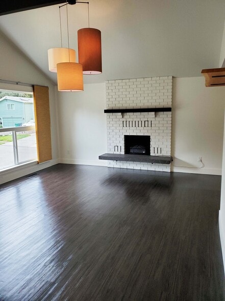 Living Room w/ electric fireplace - 8105 Spur Ct NW