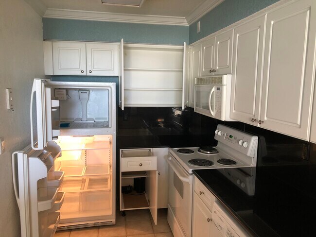 Refrigerator and stove - 2501 S Ocean Dr