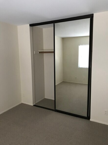 Bedroom with large closet - 1209 Robinson Ave