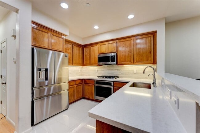 Building Photo - UPGRADED HOME IN HIGHLY CENTRAL SETTING.  RARE 3-BED/3-BATH FLOOR PLAN!