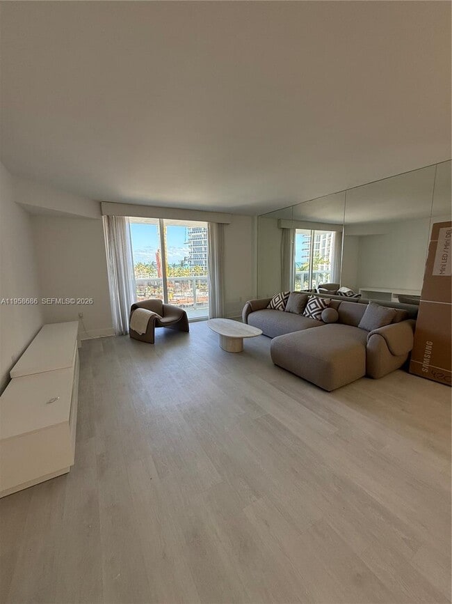 Building Photo - 10275 Collins Ave