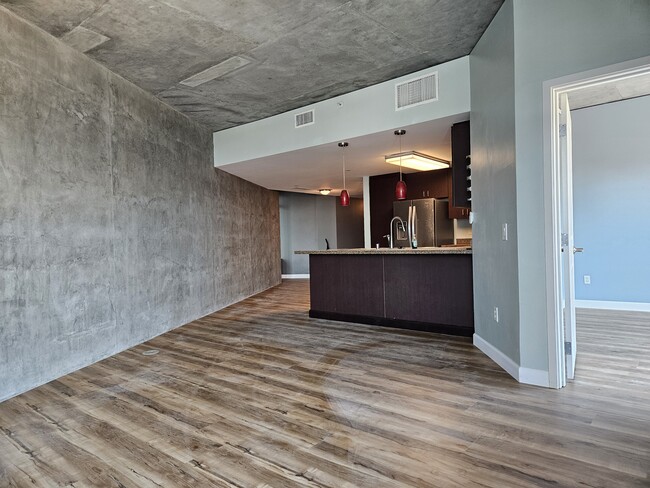 Living room looking towards front door - 1080 Park Blvd