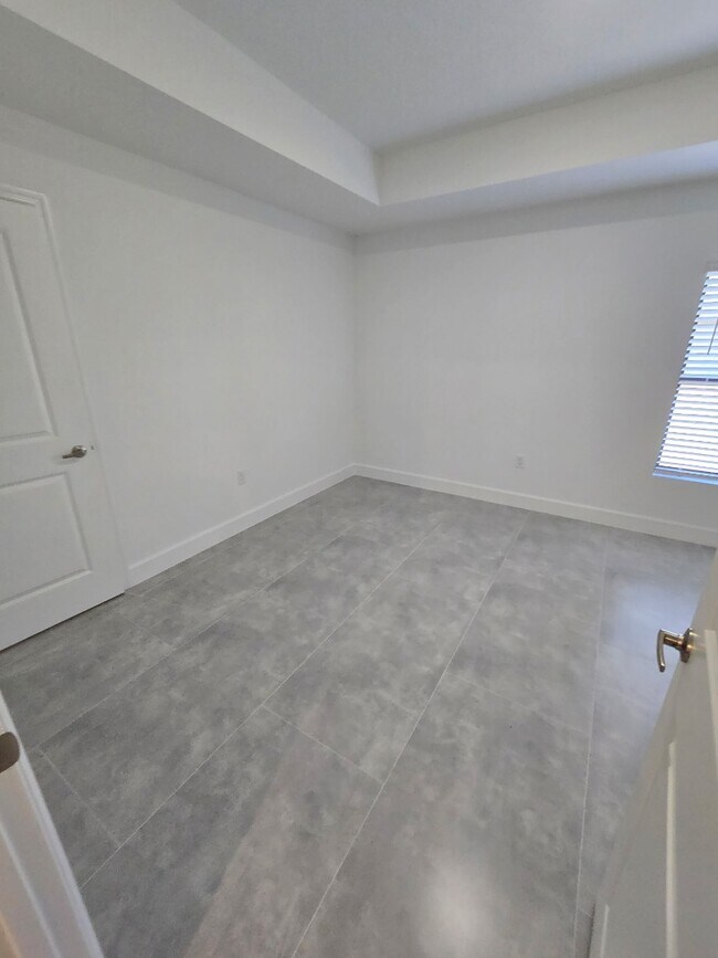 Building Photo - Brand-New 4-Bed Beauty with Attached Garage in Palm Bay – Modern Comfort, Prime Convenience!