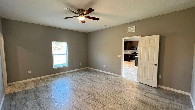 Building Photo - Beautiful 3 Bedroom Palm Bay Home with Upgrades & No Water Bill!