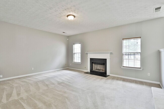Building Photo - 4BR Home with Lake View in Swim Tennis Community