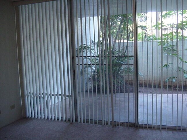 Building Photo - Pearl II - Ground Floor Unit, with large lanai, covered/secured parking, washer/dryer in unit, te...