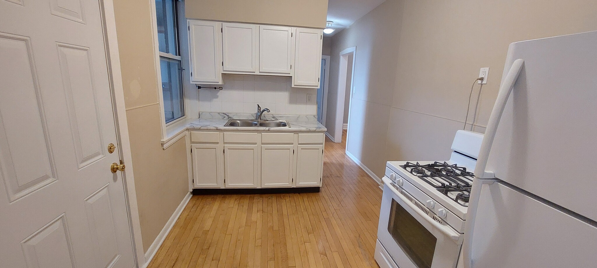 Kitchen w/attached storage - 4700 Lawndale Ave