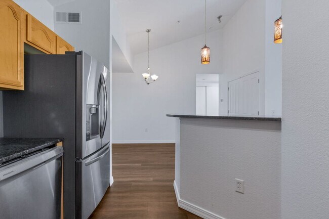 Building Photo - Stylish Longmont Condo with Vaulted Ceilings and Modern Upgrades