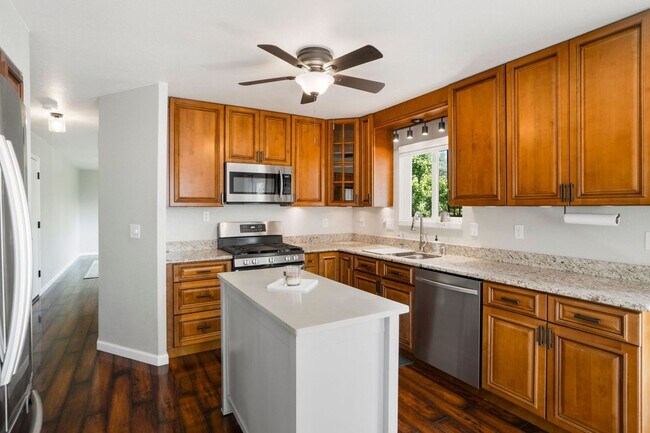 Building Photo - Updated 4 Bedroom Home with Amazing Yard, ...