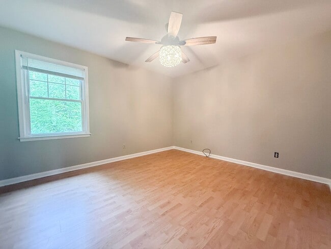 Building Photo - Spacious 3-Bedroom Home with Screened Porch, 2-Car Garage + Workshop