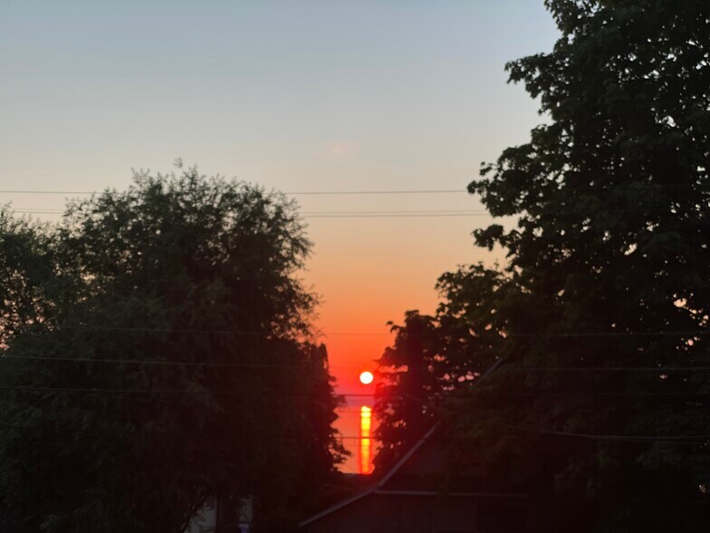 sunset view from large back deck - 631 N Garden St
