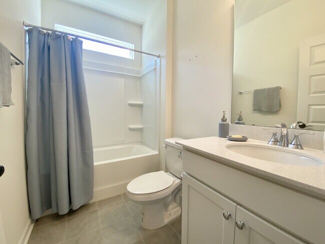 Building Photo - Four Bedroom Single Family Home in The Lak...