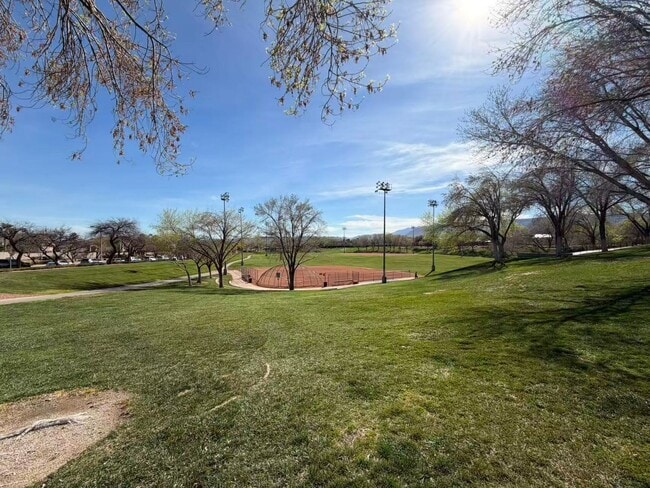 Building Photo - Wonderful corner lot home features 4 bedrooms and 3 full bathrooms