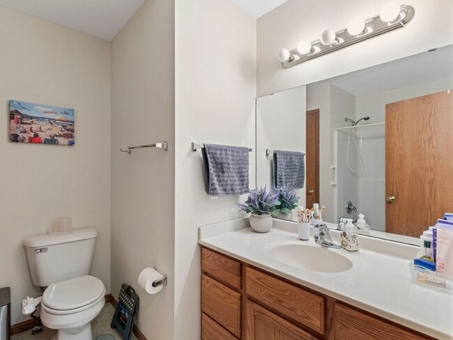 Building Photo - Spacious 3BR/3BA Condo with Finished Basement + 2-Car Garage — Available Now