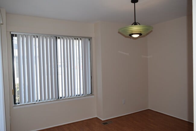 Building Photo - Updated 2-Bedroom Condo with Finished Basement, Garage, Pool, Tennis, Clubhouse