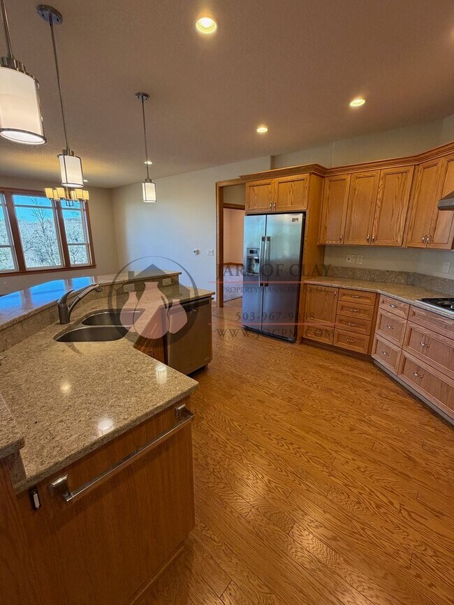 Building Photo - Custom Built Home with Lots of Unique Amenities- Workshop Area Plus 2 Car Garage!