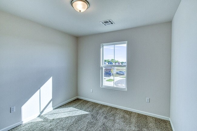 Building Photo - Brand New Construction! Lawn care included!