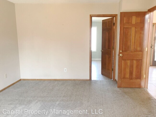 Building Photo - 4 br, 2.5 bath House - 8523 Castle Creek Dr