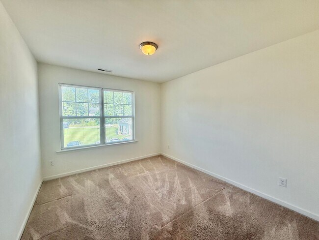 Building Photo - Spacious 3BD, 3.5BA Clayton Townhome with a Large Bonus Space Downstairs and Easy Access to Highways