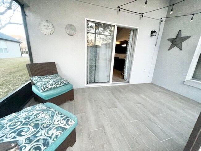 Building Photo - Lake Nona!! Spectacular 4X2 in Gated Nona Crest! All tile flooring!! 2 car garage! Move in April ...