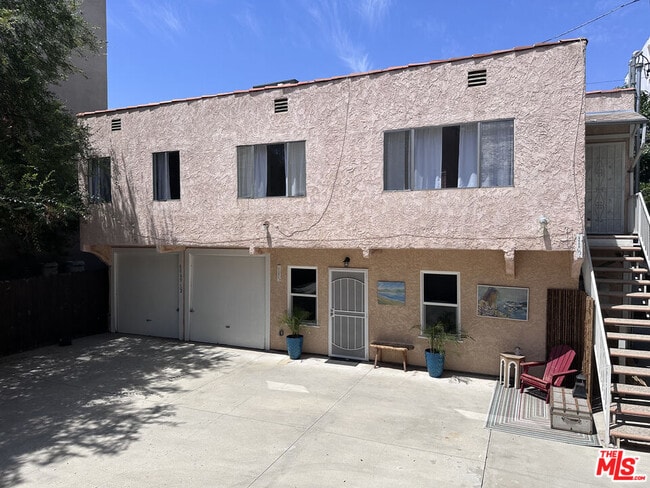 Building Photo - 6069 1/2 Cashio St