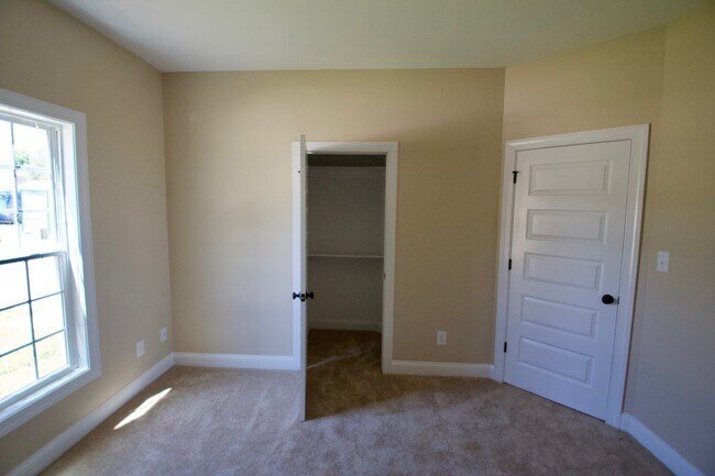 Building Photo - "Brand New Construction."  Quiet location, charming, cozy 3 bedroom duplex