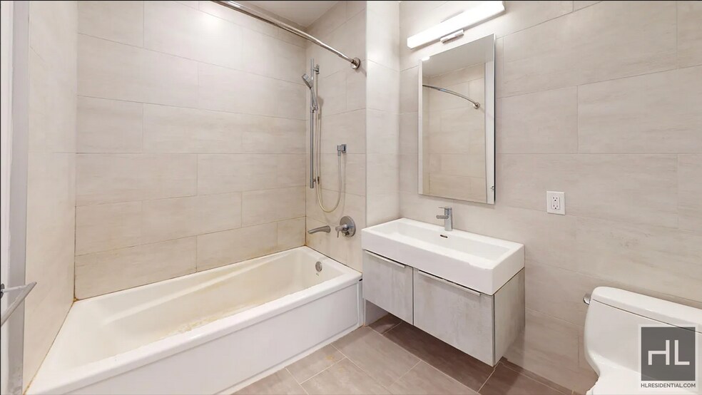 Building Photo - Northern Blvd | Flushing Studio w/Private Balcony, W/D & NO Broker's Fees!