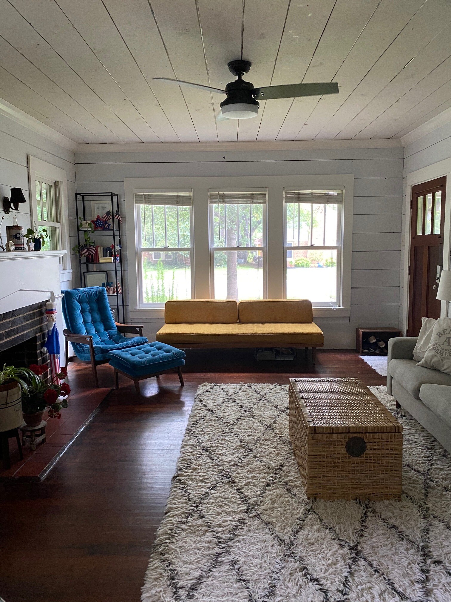 Light filled living room with gas log fireplace - 1003 Egan St