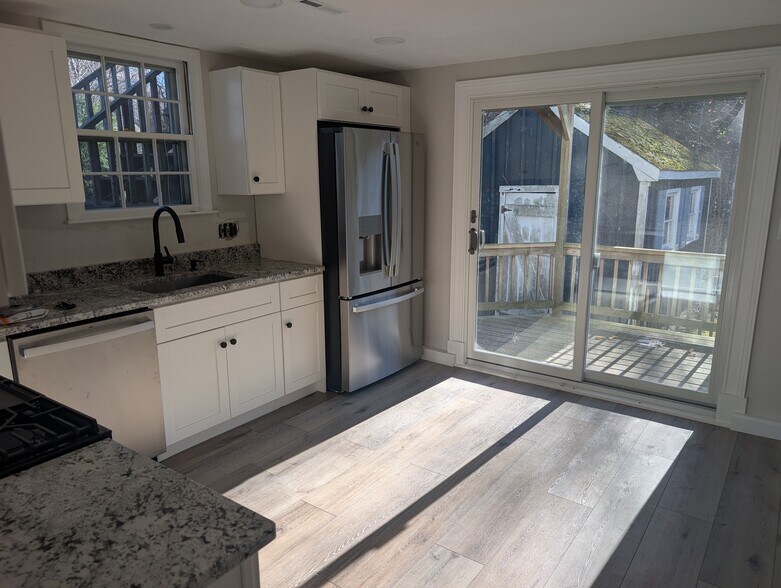 View from kitchen to private deck. - 24 Curtis St