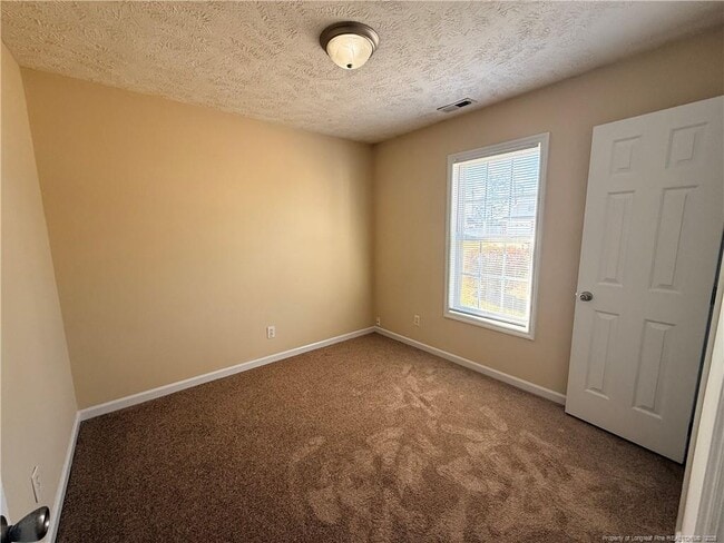 Building Photo - 203 Cypress Dr