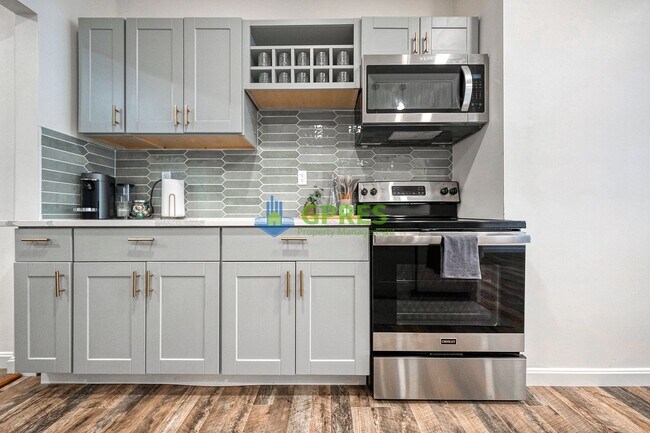 Building Photo - Furnished Elegant 3-Bedroom, 2.5 Bath Home with Hardwood Floors & Central A/C