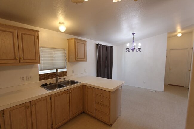 Building Photo - Bright 3-Bedroom Home with Fenced Yard + Detached 2-Car Garage