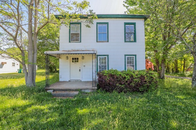 Primary Photo - Charming 4-Bedroom Home with Hardwood Floo...
