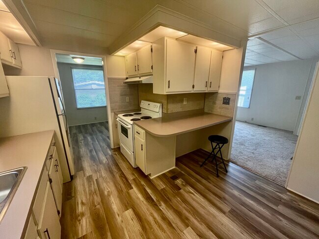 Kitchen - to the left dining room & to the right living room - 311 Rugby Rd