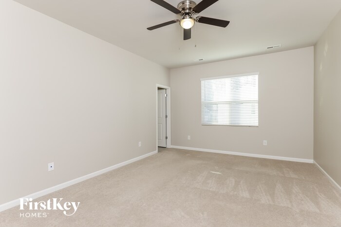 Building Photo - 304 Whispering Wind Way