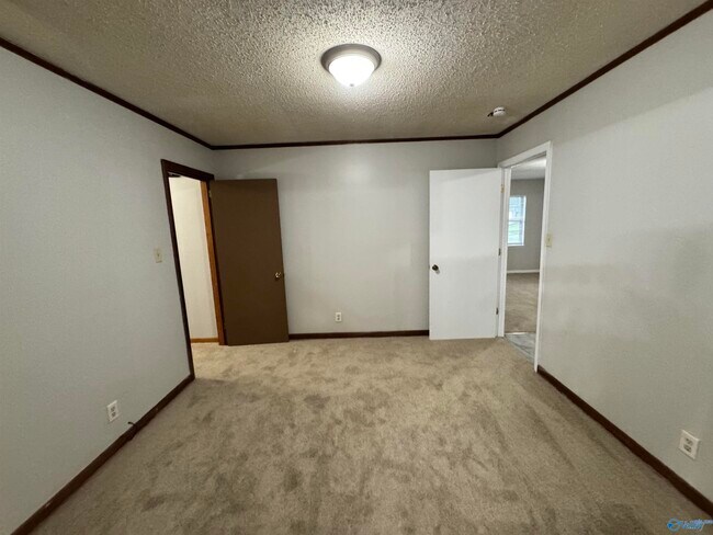Building Photo - 3812 Melody Cir NE