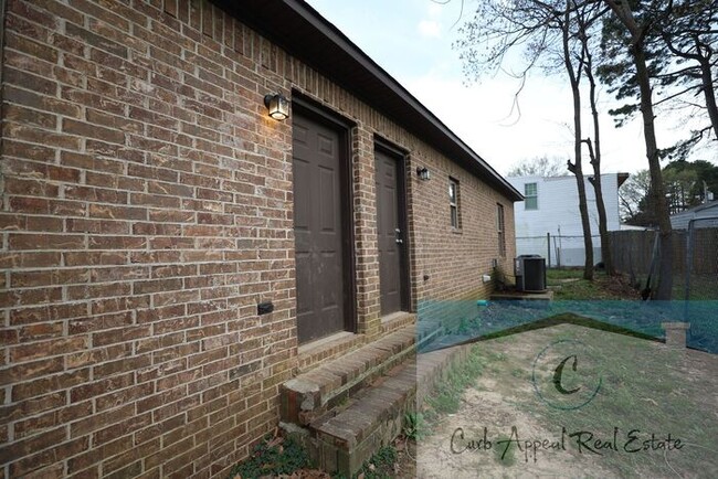 Building Photo - First month move in special $600!! Recently built 2 bed, 1 bath apartment - includes dishwasher a...