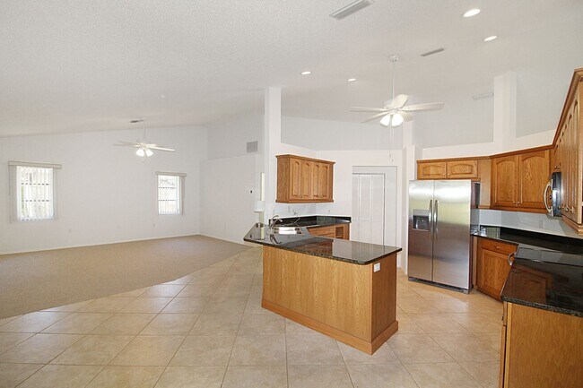 Building Photo - Lakes of Jacaranda Annual Home for Rent