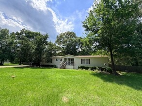 Building Photo - 7810 W Lakeshore Dr