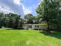 Building Photo - Minutes to Richard Fleming Park & Boat launch...