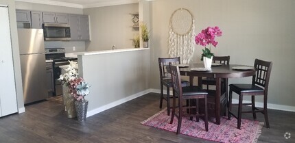 This is the Exec 1bd dinning and kitchen space. - Elevate Apartments