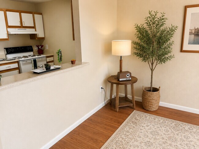 Living Room looking into Kitchen. - Nueces Bend Senior Housing