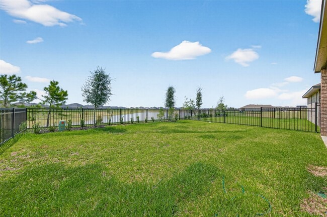 Building Photo - 27423 Sunterra Village Dr