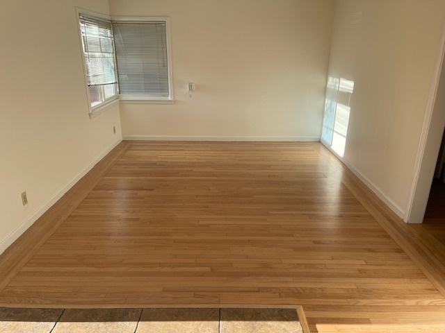 Refinished hardwood floors in living room. - 3731 46th St