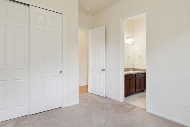 Building Photo - Modern 4-Bed Ranch in Erie with 13-Ft Ceilings, Solar Panels & EV Charger