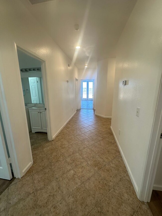 Building Photo - Spacious 4-Bedroom Home with Office, 3 Full Baths, and Modern Amenities