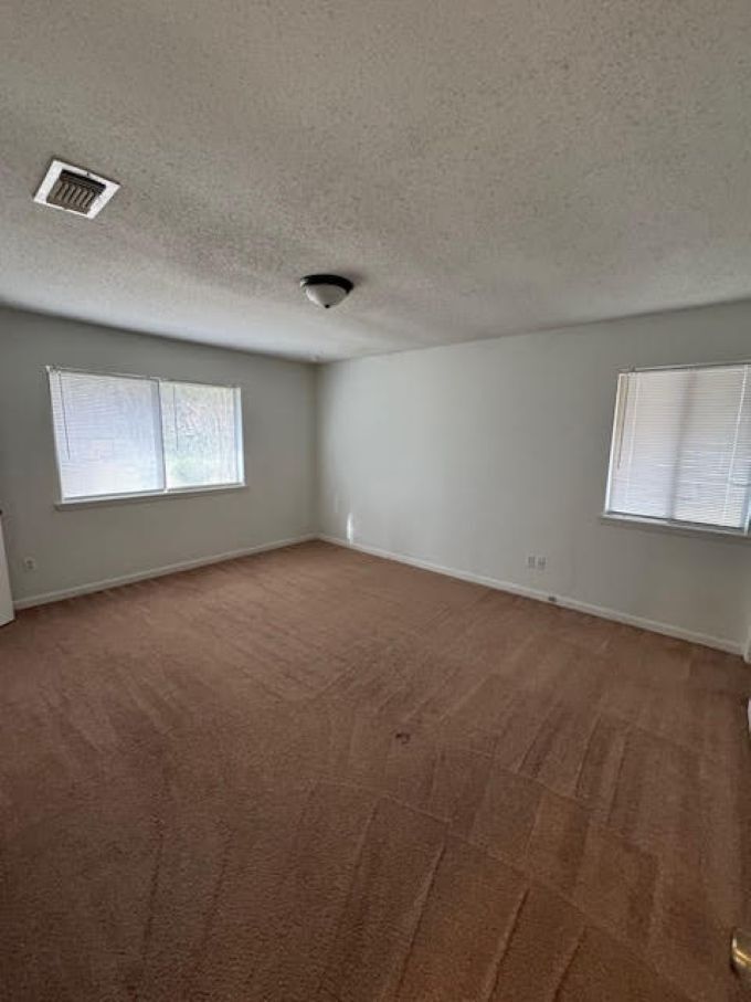 Building Photo - 6 Whispering