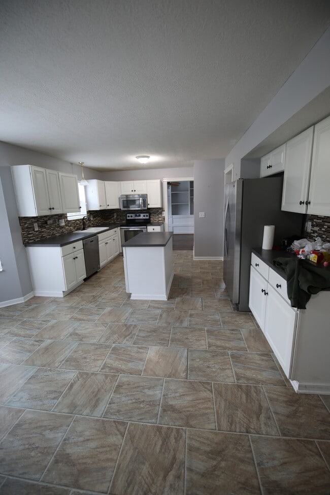 Building Photo - 4400 Greensbury Dr