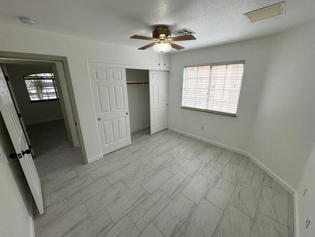 Building Photo - This inviting single-story home boasts a s...